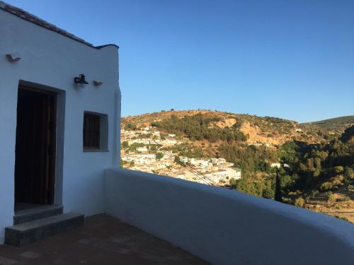 Ein Balkon oder eine Terrasse in der Unterkunft Las casillas de la Villa: SOLEÁ