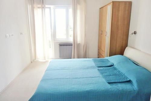 Postel nebo postele na pokoji v ubytování Apartments with a parking space Opatija - 9655