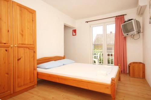 Postel nebo postele na pokoji v ubytování Apartments and rooms with parking space Orebic, Peljesac - 10191