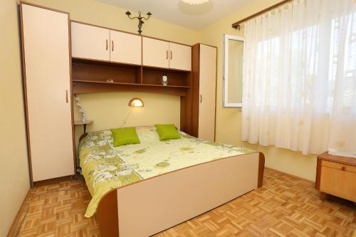 Voodi või voodid majutusasutuse Apartments by the sea Korcula - 10042 toas