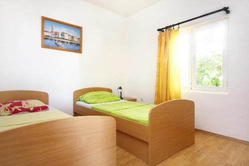 Katil atau katil-katil dalam bilik di Apartments with swimming pool Orebic, Peljesac - 10166