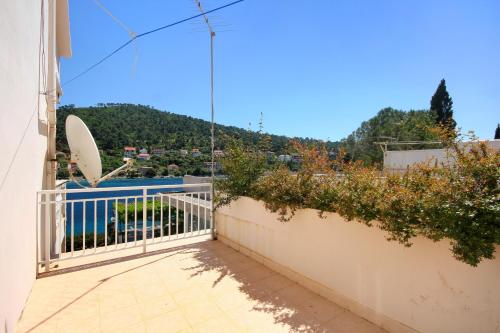 a balcony of a house with a view of a mountain at Apartments by the sea Brna, Korcula - 10057 in Smokvica
