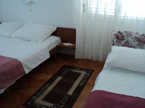 Rooms by the sea Banjol, Rab - 11716
