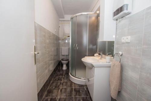 Apartments by the sea Trogir - 11760