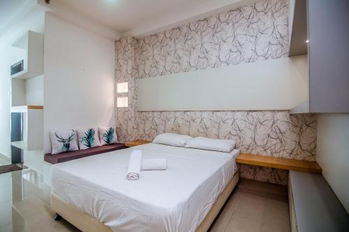 Ein Bett oder Betten in einem Zimmer der Unterkunft Shaftsbury Cyberjaya by IdealHub