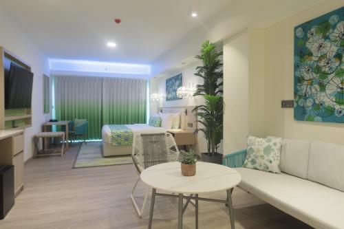TV a/nebo společenská místnost v ubytování Lime Resort El Nido