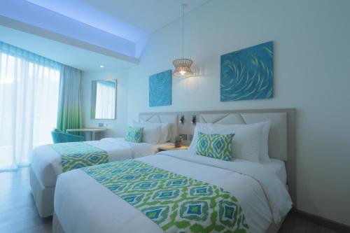 Postel nebo postele na pokoji v ubytování Lime Resort El Nido