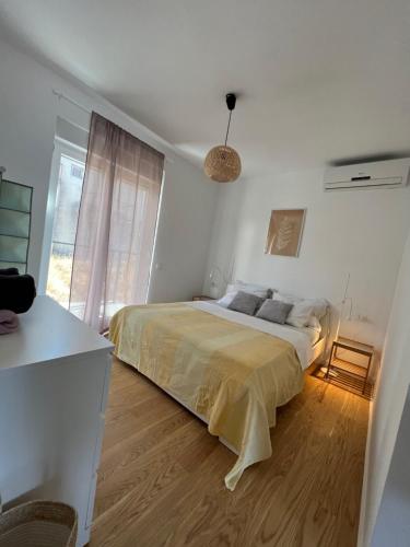 Postel nebo postele na pokoji v ubytování Apartman