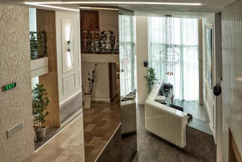 two pictures of a hallway with a room at Complex Hotelier Steaua de Mare - Hotel Delfinul in Eforie Nord