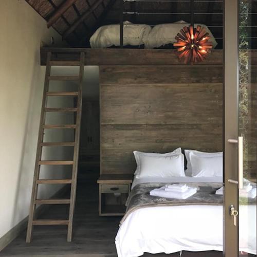 Postel nebo postele na pokoji v ubytování Duiker lodge