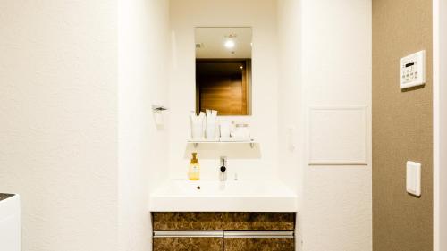 Ένα μπάνιο στο Takuto Hotel Osaka Shinsaibashi