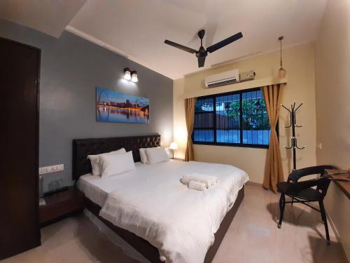 Postel nebo postele na pokoji v ubytování Luna Villa by Angel Stay - Three Bedroom Villa in Lonavala
