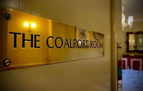 a sign on a door that reads the condor room at Park House Hotel in Shifnal