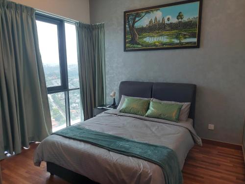 a bedroom with a large bed and a large window at Netflix # Sky Suite near Jaya One by Salaam Suites, 2 pax in Petaling Jaya