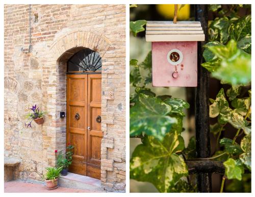 uma casa com uma porta de madeira e uma casa de pássaros em Il Capitello em San Gimignano