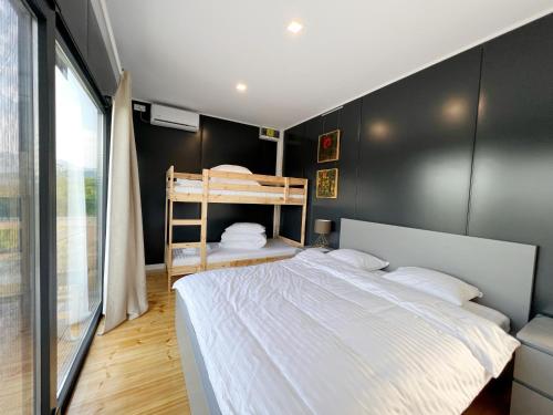 Letto o letti in una camera di FLANDRA Glamping