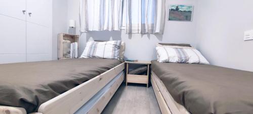 Postel nebo postele na pokoji v ubytování Dunas Beach Apartment
