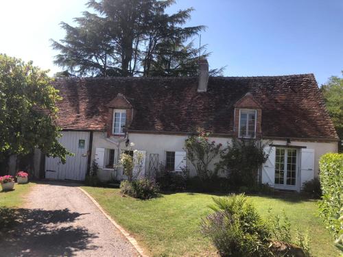 Un jardín fuera de Gîte des Bruyères