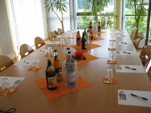 a long table with bottles of alcohol on it at DEULA Witzenhausen GmbH in Witzenhausen