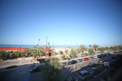 a view of a parking lot with a beach at Villa L'Aurora in Pescara