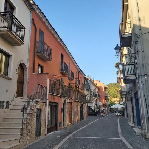 an empty street in a city with buildings at B&B Anastasia in Buccino