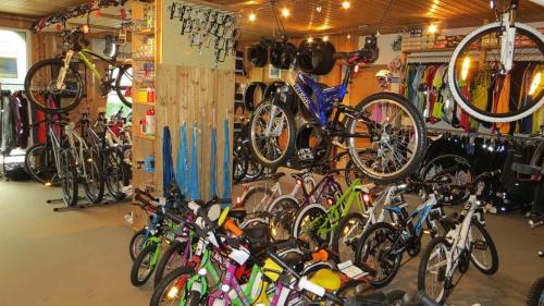 a bunch of bikes are lined up in a garage at Gästehaus Am Ludwigsberg in Bad Koetzting