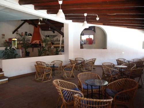Ο χώρος του lounge ή του μπαρ στο Club Esse Cala Bitta