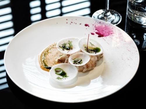 a plate of food with deviled eggs on it at J.K. Place Roma - The Leading Hotels of the World in Rome