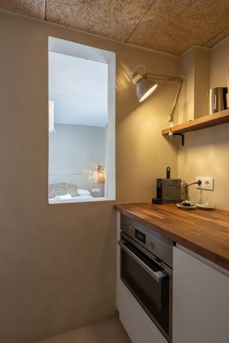 Dapur atau dapur kecil di Hostal Es Niu de Tamariu