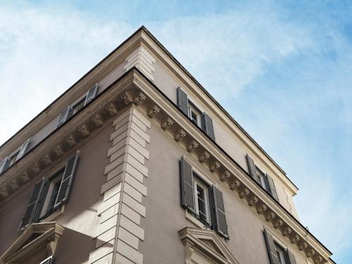 a building with windows on the side of it at J.K. Place Roma - The Leading Hotels of the World in Rome