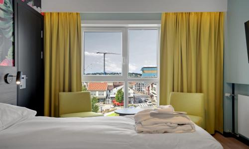 Postel nebo postele na pokoji v ubytování Thon Partner Hotel Saga
