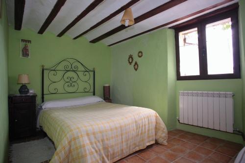 Кровать или кровати в номере Holiday home Mirador Sierra del Madero