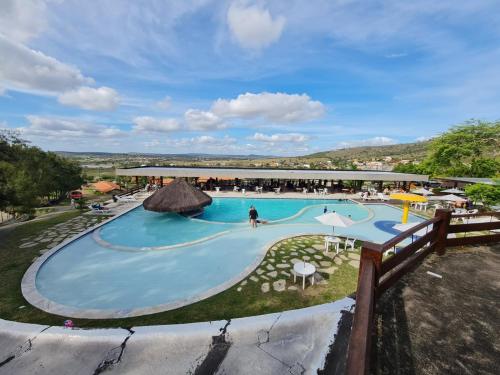Πισίνα στο ή κοντά στο Flat Monte Castelo Gravatá 2 Quartos Condomio Ao lado da Fazendinha
