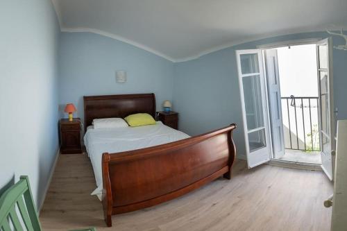 Posteľ alebo postele v izbe v ubytovaní Rosella - maison de charme au cœur du village