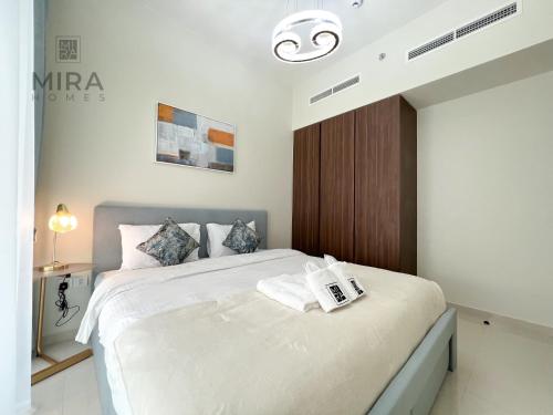 Gulta vai gultas numurā naktsmītnē Mira Holiday Homes - Newly furnished 1 bedroom in Business Bay