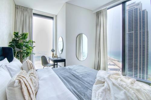 Postel nebo postele na pokoji v ubytování The Smart Concierge - Address Residence JBR