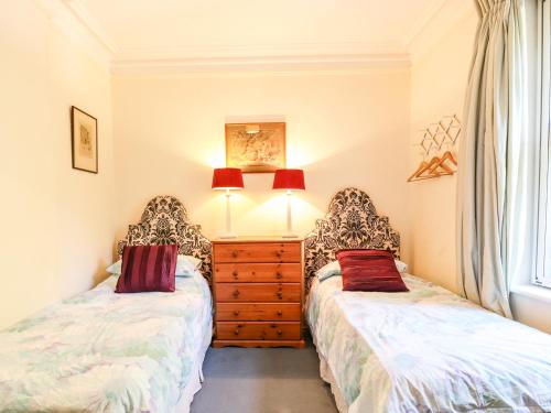 Katil atau katil-katil dalam bilik di Nethercott House