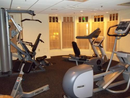 a gym with treadmills and elliptical machines at The Common Man Inn & Restaurant in Claremont