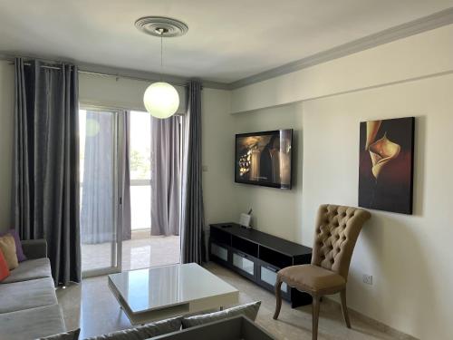 a living room with a couch and a table at Luxury 3 bedroom apartment in Nicosia City Center in Nicosia