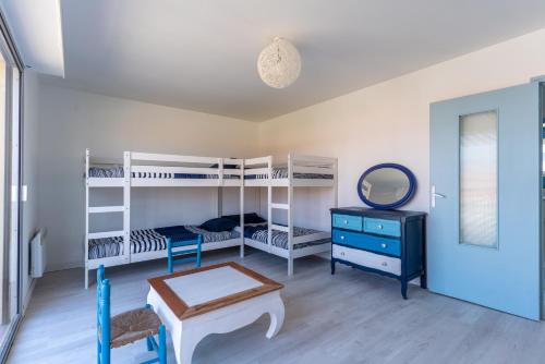 Postel nebo postele na pokoji v ubytování Maison Mimizan plage