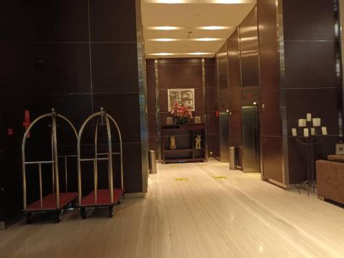 a lobby with two iron gates in a building at City Home Suites Kuala Lumpur City Centre in Kuala Lumpur