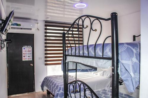 Postel nebo postele na pokoji v ubytování Soga Hostal