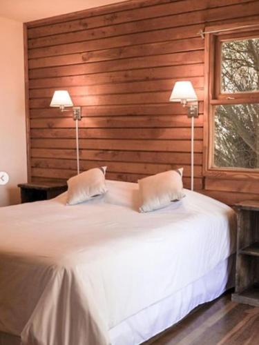 Postel nebo postele na pokoji v ubytování Hosteria Kaiken