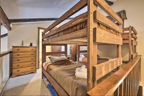 a large wooden bunk bed in a bedroom at Ian's Camelback House in Tannersville