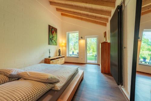 A bed or beds in a room at Ferienhaus Thale