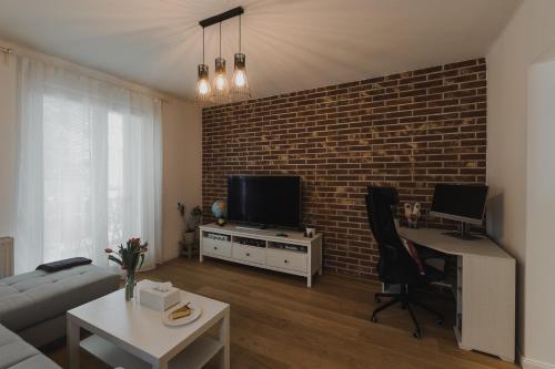 TV a/nebo společenská místnost v ubytování Quiet apartment in new city center, NIVY