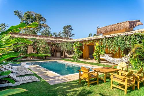 Casa Manga Rosa Trancoso - Um manto de flores