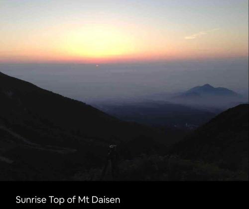 asunrise top of mt nir dalason with the sun setting over at Da Fern in Sakaiminato