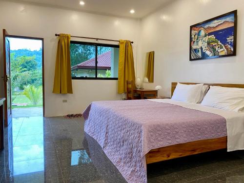 Postel nebo postele na pokoji v ubytování Strutz Art Garden Resort