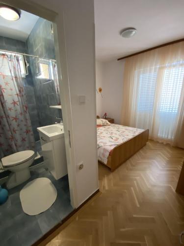 Apartments with parking space Kampor, Rab - 12273